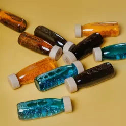 Petit Boum Sensorische Fles Float - Turquoise -speelgarages, auto's & voertuigen Winkel petit boum sensorische fles float turquoise 4